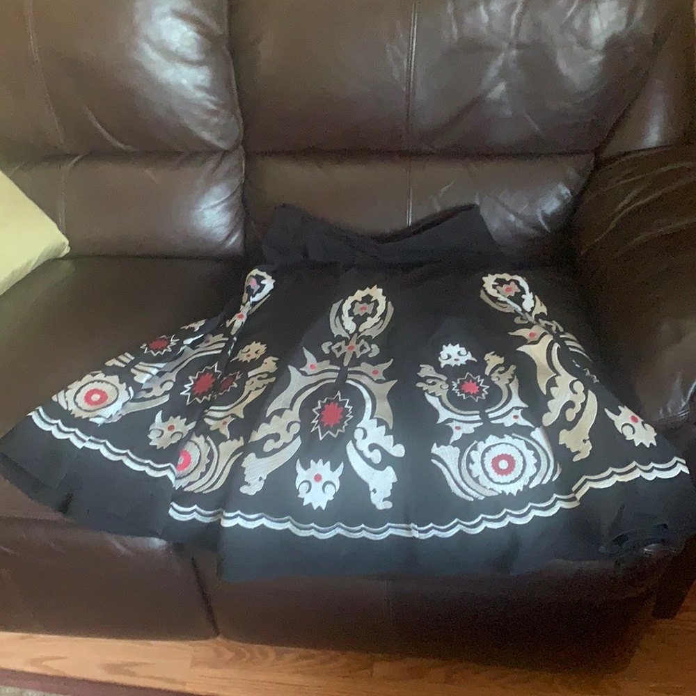 Block skirt with white paisley design with red highlights
